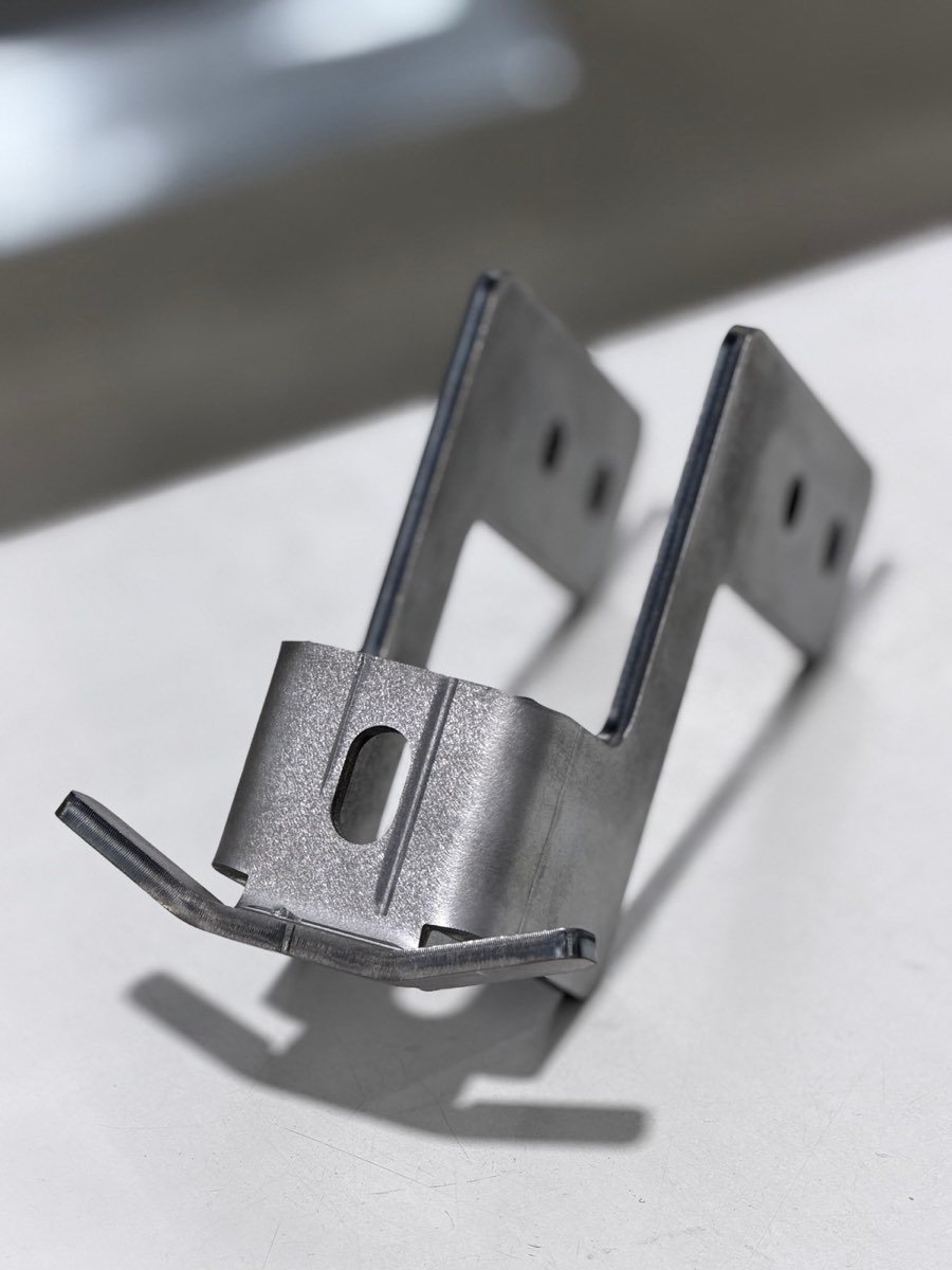 Formed sheet-metal bracket for automation equipment
